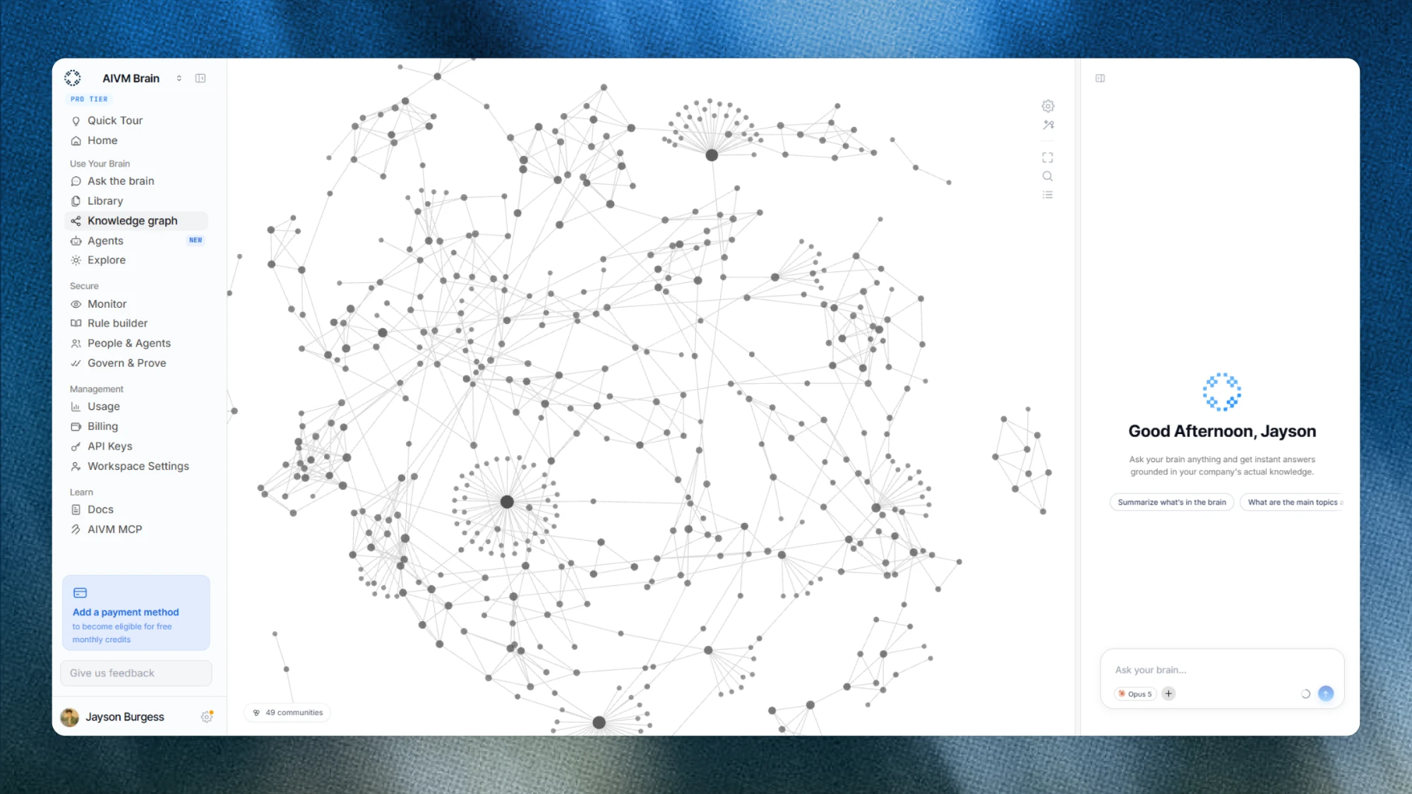 The Brain app with the Knowledge graph open: hundreds of connected nodes clustered into communities, the navigation sidebar on the left and the Ask your brain panel on the right.